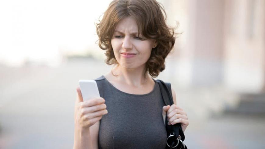 woman ignoring telemarketing call